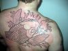 crap tattoo on back